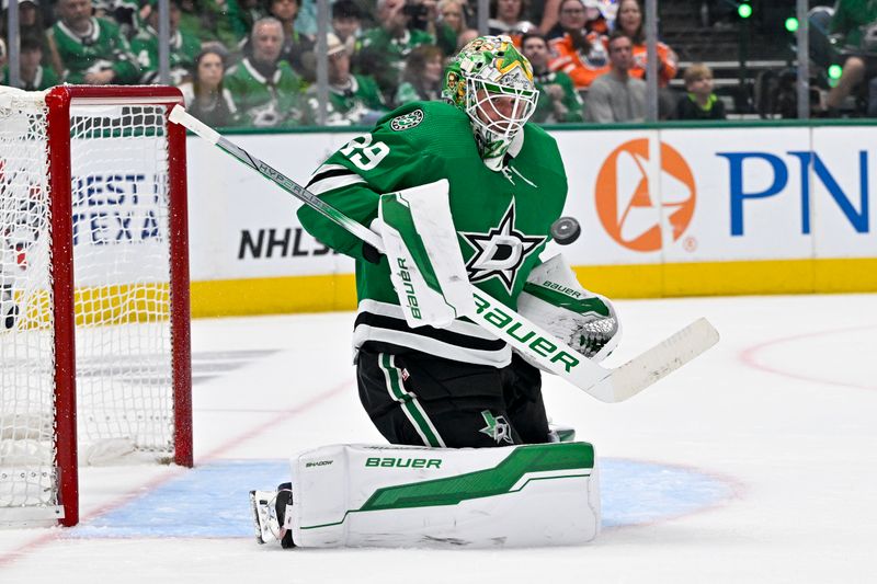 May 25, 2024; Dallas, Texas, USA; Dallas Stars goaltender Jake Oettinger (29) makes a save on a Edmonton Oilers shot during the third period in game two of the Western Conference Final of the 2024 Stanley Cup Playoffs at American Airlines Center. Mandatory Credit: Jerome Miron-USA TODAY Sports