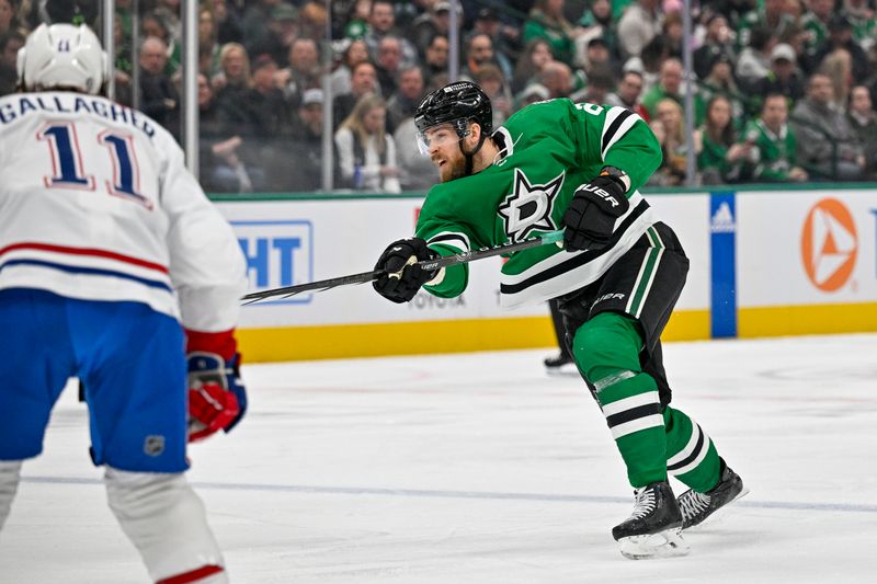 Jan 2, 2024; Dallas, Texas, USA; Dallas Stars defenseman Jani Hakanpaa (2) shoots the puck in the Montreal Canadiens zone during the second period at the American Airlines Center. Mandatory Credit: Jerome Miron-USA TODAY Sports