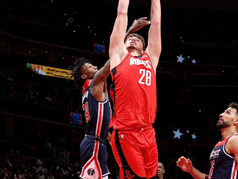 WASHINGTON, DC -? APRIL 9: Alperen Sengun #28 of the Houston Rockets drives to the basket against the Washington Wizards  on April 9, 2023 at Capital One Arena in Washington, DC. NOTE TO USER: User expressly acknowledges and agrees that, by downloading and or using this Photograph, user is consenting to the terms and conditions of the Getty Images License Agreement. Mandatory Copyright Notice: Copyright 2023 NBAE (Photo by Stephen Gosling/NBAE via Getty Images)