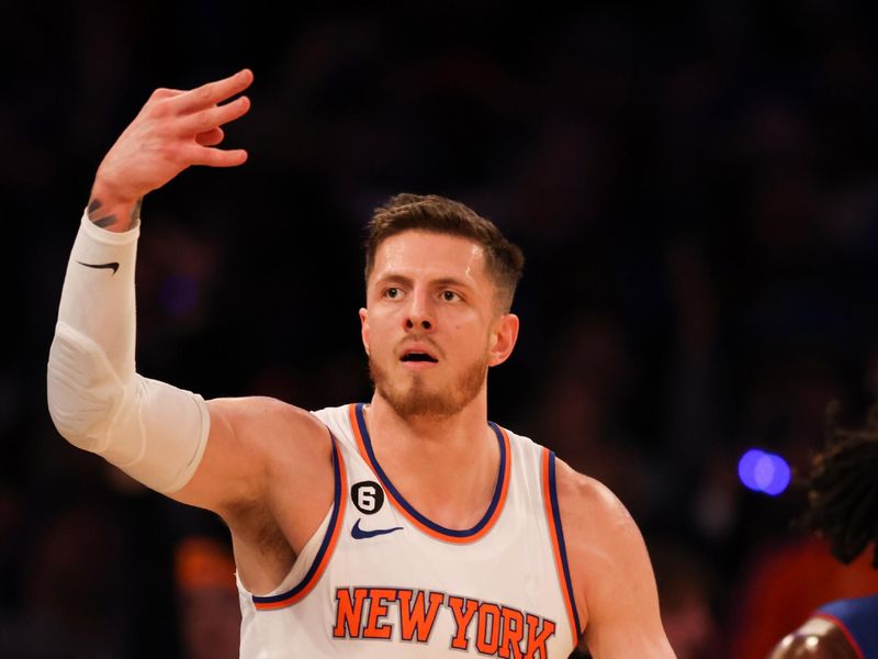 NEW YORK, NEW YORK - OCTOBER 21: Isaiah Hartenstein #55 of the New York Knicks reacts after making a three-pointer during the first quarter of the game against the Detroit Pistons at Madison Square Garden on October 21, 2022 in New York City. NOTE TO USER: User expressly acknowledges and agrees that,  by downloading and or using this photograph,  User is consenting to the terms and conditions of the Getty Images License Agreement. (Photo by Dustin Satloff/Getty Images)