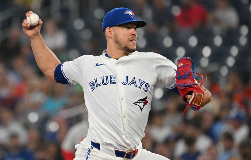 Jun 4, 2025; Toronto, Ontario, CAN; Toronto Blue Jays starting pitcher Jose Berrios (17) delivers a pitch against the Philadelphia Phillies in the first inning at Rogers Centre. Mandatory Credit: Dan Hamilton-Imagn Images