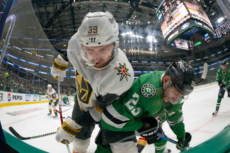 Apr 24, 2024; Dallas, Texas, USA; Vegas Golden Knights right wing Anthony Mantha (39) and Dallas Stars defenseman Esa Lindell (23) battle for control of the puck in the Stars zone in the first period in game two of the first round of the 2024 Stanley Cup Playoffs at American Airlines Center. Mandatory Credit: Jerome Miron-USA TODAY Sports