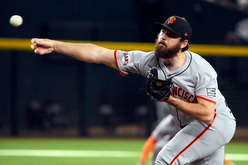 Jun 5, 2024; Phoenix, Arizona, USA; San Francisco Giants pitcher Ryan Walker (74) throws against the Arizona Diamondbacks in the seventh inning at Chase Field. Mandatory Credit: Rick Scuteri-USA TODAY Sports