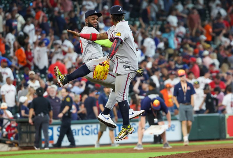 Apr 17, 2024; Houston, Texas, USA;Atlanta Braves designated hitter Marcell Ozuna (20) and right fielder Ronald Acuna Jr. (13) celebrate the win against the Houston Astros  Minute Maid Park. Mandatory Credit: Thomas Shea-USA TODAY Sports