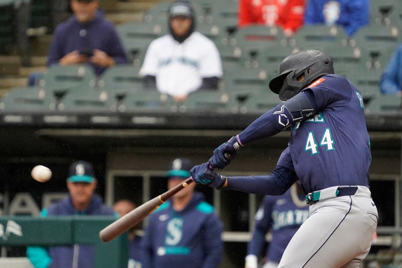 May 21, 2025; Chicago, Illinois, USA; Seattle Mariners outfielder Julio Rodriguez (44) hits a three-run home run against the Chicago White Sox during the first inning at Rate Field. Mandatory Credit: David Banks-Imagn Images