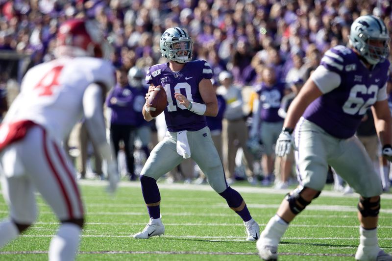 Oct 26, 2019; Manhattan, KS, USA; Kansas State Wildcats quarterback Skylar Thompson (10) drops back to pass during the first quarter of a game against the Oklahoma Sooners at Bill Snyder Family Stadium. Mandatory Credit: Scott Sewell-USA TODAY Sports