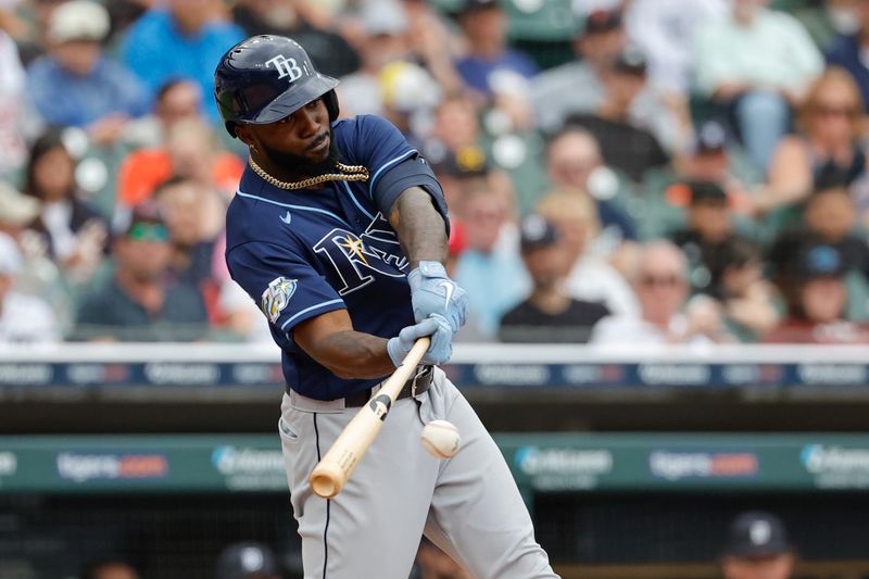 Aug 6, 2023; Detroit, Michigan, USA; Tampa Bay Rays left fielder Randy Arozarena (56) hits a single in the second inning against the Detroit Tigers at Comerica Park. Mandatory Credit: Rick Osentoski-USA TODAY Sports