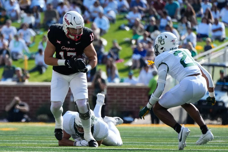 Nov 4, 2023; Waco, Texas, USA;  Houston Cougars tight end Mike O'Laughlin (17) catches a pass against Baylor Bears cornerback Chateau Reed (21) during the first half at McLane Stadium. Mandatory Credit: Chris Jones-USA TODAY Sports