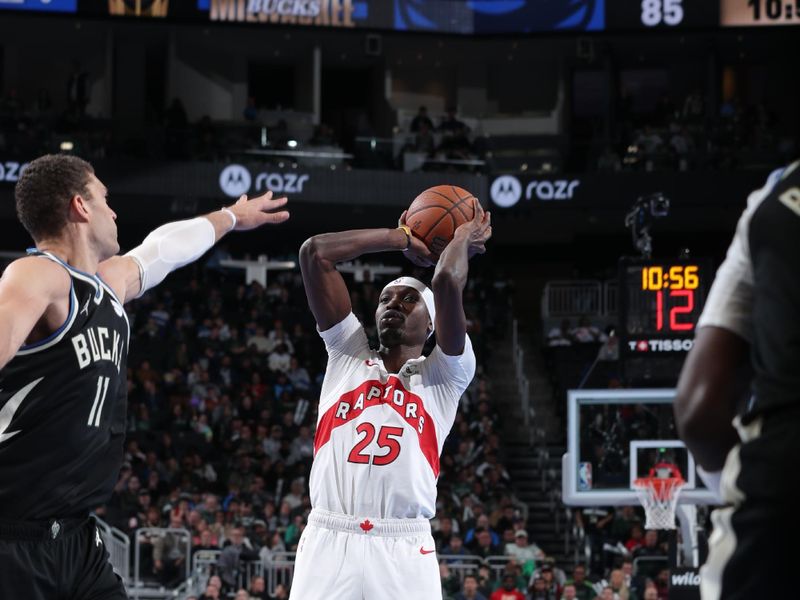 MILWAUKEE, WI - NOVEMBER 12:   Chris Boucher #25 of the Toronto Raptors shoots the ball during the game against the Milwaukee Bucks during the Emirates NBA Cup game on November 12, 2024 at Fiserv Forum Center in Milwaukee, Wisconsin. NOTE TO USER: User expressly acknowledges and agrees that, by downloading and or using this Photograph, user is consenting to the terms and conditions of the Getty Images License Agreement. Mandatory Copyright Notice: Copyright 2024 NBAE (Photo by Gary Dineen/NBAE via Getty Images).