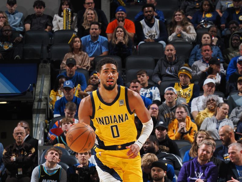 INDIANAPOLIS, IN - NOVEMBER 10:  Tyrese Haliburton #0 of the Indiana Pacers dribbles the ball during the game against the New York Knicks during a regular season game on November 10, 2024 at Gainbridge Fieldhouse in Indianapolis, Indiana. NOTE TO USER: User expressly acknowledges and agrees that, by downloading and or using this Photograph, user is consenting to the terms and conditions of the Getty Images License Agreement. Mandatory Copyright Notice: Copyright 2024 NBAE (Photo by Ron Hoskins/NBAE via Getty Images)