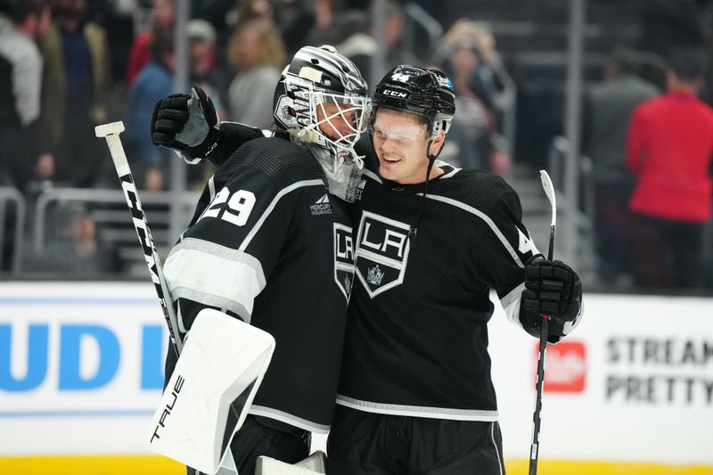 Oct 24, 2023; Los Angeles, California, USA; LA Kings goaltender Pheonix Copley (29) and defenseman Mikey Anderson (44) celebrate after the game against the Arizona Coyotes at Crypto.com Arena. Mandatory Credit: Kirby Lee-USA TODAY Sports