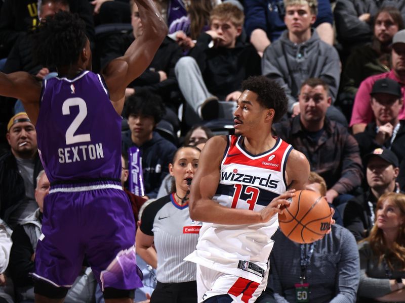 SALT LAKE CITY, UT - MARCH 4:  Jordan Poole #13 of the Washington Wizards handles the ball during the game against the Utah Jazz on March 4, 2024 at vivint.SmartHome Arena in Salt Lake City, Utah. NOTE TO USER: User expressly acknowledges and agrees that, by downloading and or using this Photograph, User is consenting to the terms and conditions of the Getty Images License Agreement. Mandatory Copyright Notice: Copyright 2024 NBAE (Photo by Melissa Majchrzak/NBAE via Getty Images)