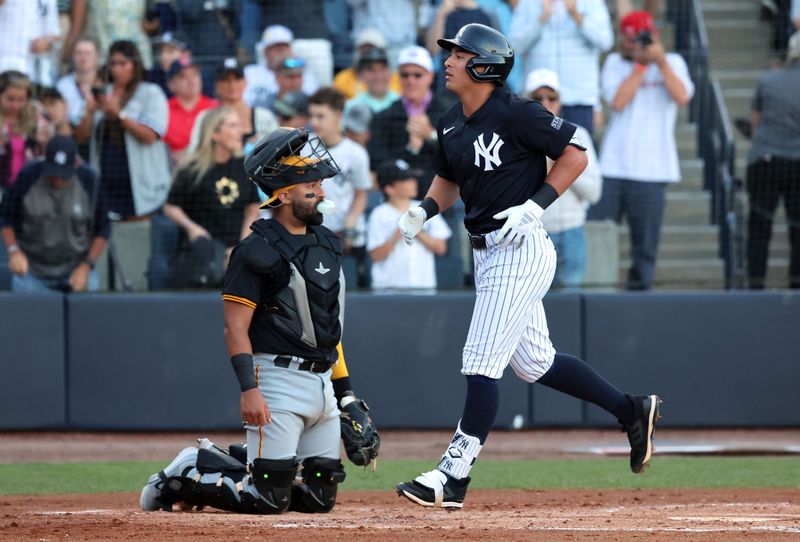 Mar 20, 2024; Tampa, Florida, USA; New York Yankees shortstop Anthony Volpe (11)  runs past home plate after he hit a home run during the first inning against the Pittsburgh Pirates at George M. Steinbrenner Field. Mandatory Credit: Kim Klement Neitzel-USA TODAY Sports