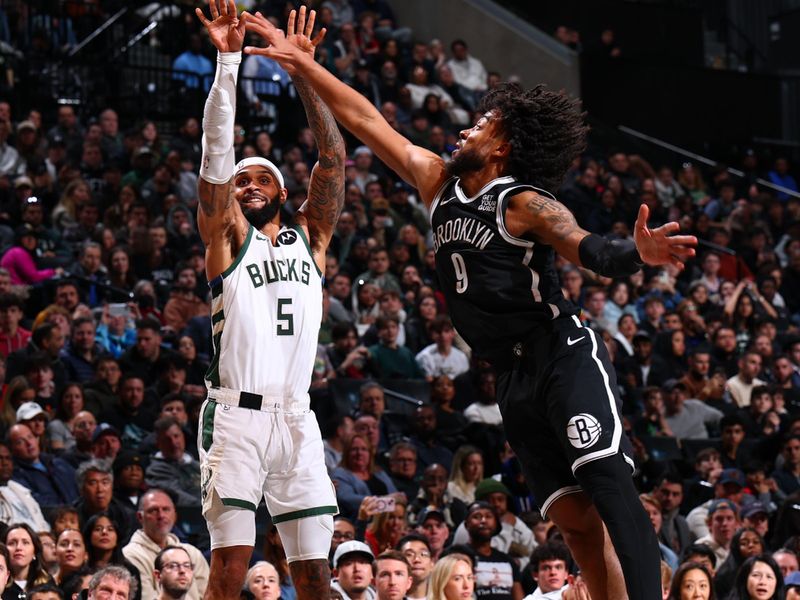 BROOKLYN, NY - DECEMBER 8: Gary Trent Jr. #5 of the Milwaukee Bucks shoots a three point basket during the game against the Brooklyn Nets on December 8, 2024 at Barclays Center in Brooklyn, New York. NOTE TO USER: User expressly acknowledges and agrees that, by downloading and or using this Photograph, user is consenting to the terms and conditions of the Getty Images License Agreement. Mandatory Copyright Notice: Copyright 2024 NBAE (David L. Nemec/NBAE via Getty Images)