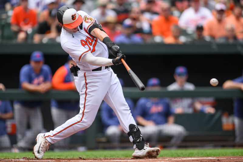 Aug 6, 2023; Baltimore, Maryland, USA; Baltimore Orioles catcher Adley Rutschman (35) hits a pitch during the first inning against the New York Mets at Oriole Park at Camden Yards. Mandatory Credit: Reggie Hildred-USA TODAY Sports