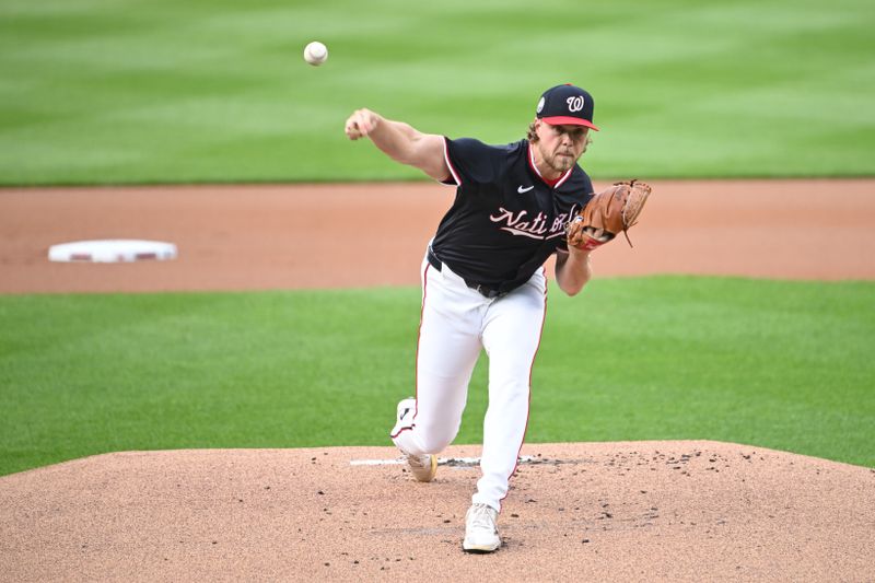 Jun 5, 2025; Washington, District of Columbia, USA; Washington Nationals starting pitcher Jake Irvin (27) throws a pitch during the first inning against the Chicago Cubs at Nationals Park. Mandatory Credit: Rafael Suanes-Imagn Images