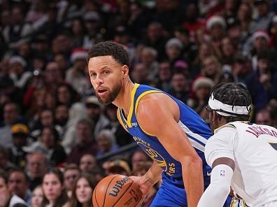 DENVER, CO - DECEMBER 25: Stephen Curry #30 of the Golden State Warriors looks on during the game against the Denver Nuggets on December 25, 2023 at the Ball Arena in Denver, Colorado. NOTE TO USER: User expressly acknowledges and agrees that, by downloading and/or using this Photograph, user is consenting to the terms and conditions of the Getty Images License Agreement. Mandatory Copyright Notice: Copyright 2023 NBAE (Photo by Bart Young/NBAE via Getty Images)