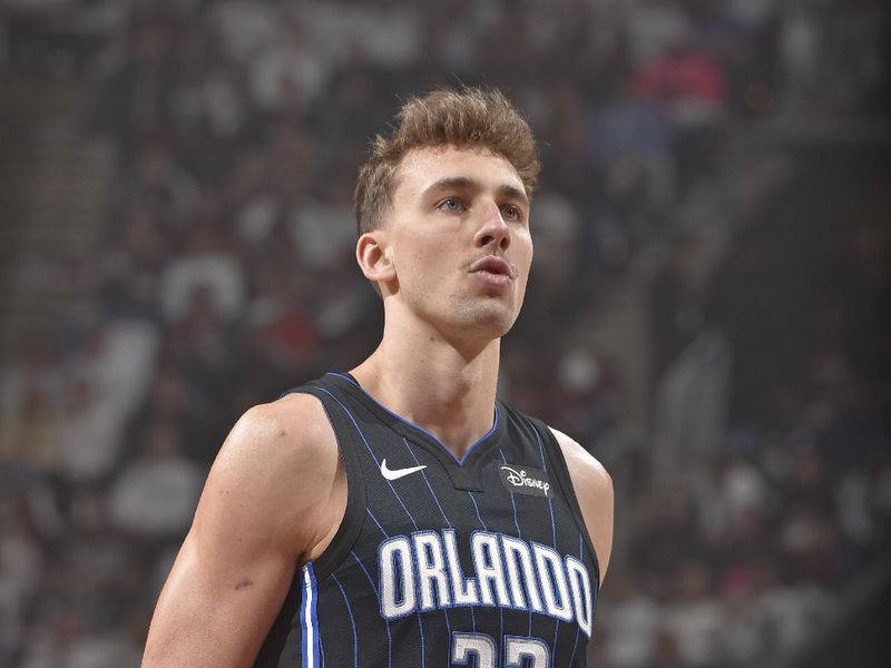 CLEVELAND, OH - APRIL 20: Franz Wagner #22 of the Orlando Magic prepares to shoot a free throw during Round 1 Game 1 of the 2024 NBA Playoffs against the Cleveland Cavaliers on April 20, 2024 at Rocket Mortgage FieldHouse in Cleveland, Ohio. NOTE TO USER: User expressly acknowledges and agrees that, by downloading and/or using this Photograph, user is consenting to the terms and conditions of the Getty Images License Agreement. Mandatory Copyright Notice: Copyright 2024 NBAE (Photo by David Liam Kyle/NBAE via Getty Images)