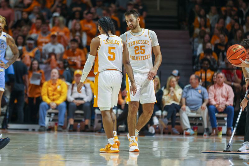 Nov 30, 2022; Knoxville, Tennessee, USA; Tennessee Volunteers guard Zakai Zeigler (5) and guard Santiago Vescovi (25) during the game against the McNeese State Cowboys at Thompson-Boling Arena. Mandatory Credit: Randy Sartin-USA TODAY Sports