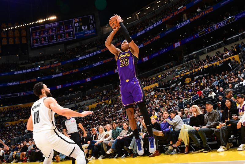 LOS ANGELES, CA - JANUARY 17: Rui Hachimura #28 of the Los Angeles Lakers shoots the ball during the game against the Brooklyn Nets on January 17, 2025 at Crypto.Com Arena in Los Angeles, California. NOTE TO USER: User expressly acknowledges and agrees that, by downloading and/or using this Photograph, user is consenting to the terms and conditions of the Getty Images License Agreement. Mandatory Copyright Notice: Copyright 2025 NBAE (Photo by Adam Pantozzi/NBAE via Getty Images)