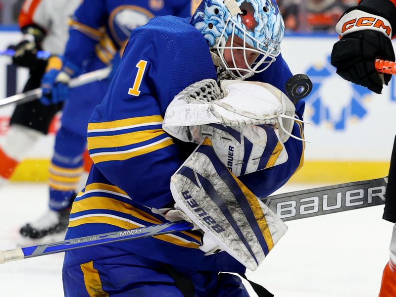 Apr 5, 2024; Buffalo, New York, USA;  Buffalo Sabres goaltender Ukko-Pekka Luukkonen (1) makes a save during the third period against the Philadelphia Flyers at KeyBank Center. Mandatory Credit: Timothy T. Ludwig-USA TODAY Sports