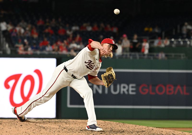 Jul 1, 2024; Washington, District of Columbia, USA; Washington Nationals relief pitcher Jordan Weems (51) throws a pitch against the New York Mets during the tenth inning at Nationals Park. Mandatory Credit: Rafael Suanes-USA TODAY Sports