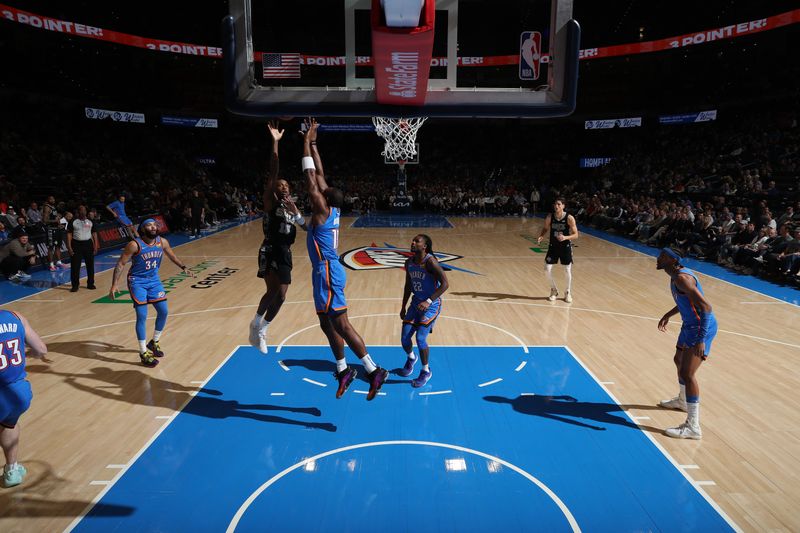 OKLAHOMA CITY, OK - APRIL 10:  Jamaree Bouyea #15 of the San Antonio Spurs  drives to the basket during the game against the Oklahoma City Thunder on April 10, 2024 at Paycom Arena in Oklahoma City, Oklahoma. NOTE TO USER: User expressly acknowledges and agrees that, by downloading and or using this photograph, User is consenting to the terms and conditions of the Getty Images License Agreement. Mandatory Copyright Notice: Copyright 2024 NBAE (Photo by Zach Beeker/NBAE via Getty Images)