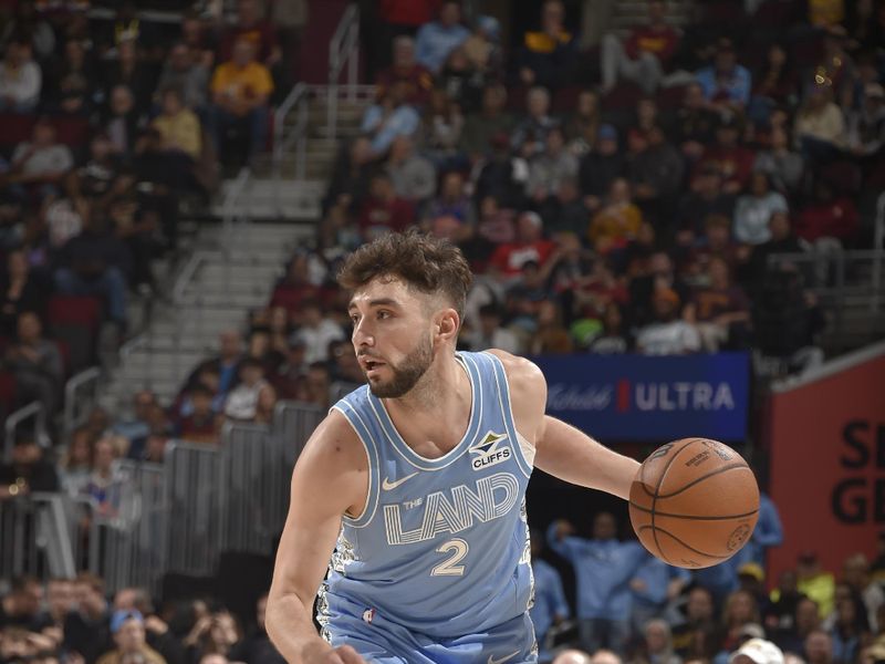 CLEVELAND, OH - NOVEMBER 17: Ty Jerome #2 of the Cleveland Cavaliers dribbles the ball during the game against the Charlotte Hornets on November 17, 2024 at Rocket Mortgage FieldHouse in Cleveland, Ohio. NOTE TO USER: User expressly acknowledges and agrees that, by downloading and/or using this Photograph, user is consenting to the terms and conditions of the Getty Images License Agreement. Mandatory Copyright Notice: Copyright 2024 NBAE (Photo by David Liam Kyle/NBAE via Getty Images)