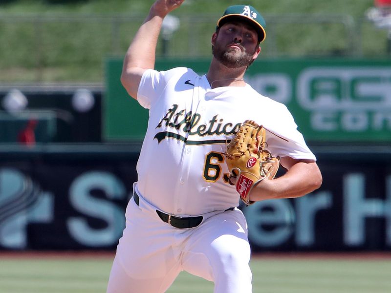 Sep 10, 2025; West Sacramento, California, USA; Athletics starting pitcher Mason Barnett (63) throws a pitch against the Boston Red Sox during the first inning at Sutter Health Park. Mandatory Credit: Dennis Lee-Imagn Images