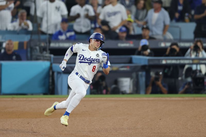 Oct 25, 2024; Los Angeles, California, USA; Los Angeles Dodgers third baseman Enrique Hernandez (8) runs the bases after hitting a triple in the fifth inning against the New York Yankees during game one of the 2024 MLB World Series at Dodger Stadium. Mandatory Credit:  Jason Parkhurst-Imagn Images