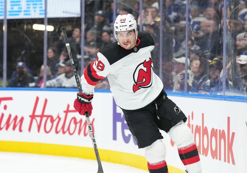 Mar 26, 2024; Toronto, Ontario, CAN; New Jersey Devils right wing Timo Meier (28) celebrates after scoring a goal against the Toronto Maple Leafs during the second period at Scotiabank Arena. Mandatory Credit: Nick Turchiaro-USA TODAY Sports