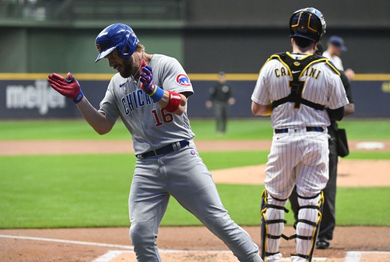 Sep 30, 2023; Milwaukee, Wisconsin, USA; Chicago Cubs third baseman Patrick Wisdom (16) celebrates a home run against the Milwaukee Brewers in the first inning at American Family Field. Mandatory Credit: Michael McLoone-USA TODAY Sports