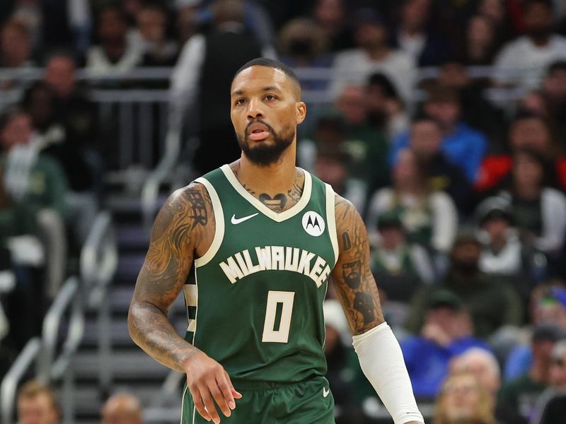 MILWAUKEE, WISCONSIN - DECEMBER 21: Damian Lillard #0 of the Milwaukee Bucks handles the ball during a game against the Orlando Magic at Fiserv Forum on December 21, 2023 in Milwaukee, Wisconsin. NOTE TO USER: User expressly acknowledges and agrees that, by downloading and or using this photograph, User is consenting to the terms and conditions of the Getty Images License Agreement. (Photo by Stacy Revere/Getty Images)