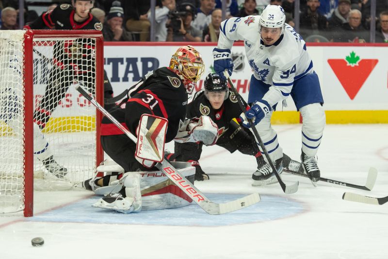 Dec 7, 2023; Ottawa, Ontario, CAN; Toronto Maple Leafs center Auston Matthews (34) follows the puck following a save by Ottawa Senators goalie Anton Forsberg (31) in the second period at the Canadian Tire Centre. Mandatory Credit: Marc DesRosiers-USA TODAY Sports