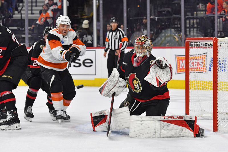 Mar 2, 2024; Philadelphia, Pennsylvania, USA; Ottawa Senators goaltender Mads Sogaard (40) makes a save against Philadelphia Flyers right wing Cam Atkinson (89) during the first period at Wells Fargo Center. Mandatory Credit: Eric Hartline-USA TODAY Sports