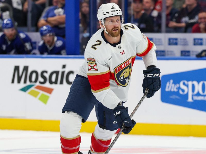 Oct 2, 2025; Tampa, Florida, USA; Florida Panthers defenseman Jeff Petry (2) controls the puck against the Tampa Bay Lightning in the second period at Benchmark International Arena. Mandatory Credit: Nathan Ray Seebeck-Imagn Images