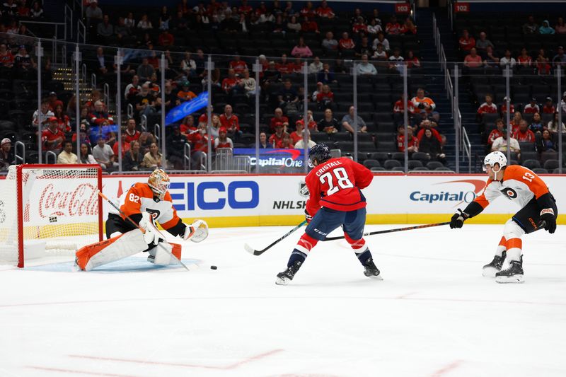 Sep 22, 2024; Washington, District of Columbia, USA; Philadelphia Flyers goaltender Ivan Fedotov (82) makes a save on Andrew Cristall (28) Flyers defenseman Adam Ginning (13) defends in the first period at Capital One Arena. Mandatory Credit: Geoff Burke-Imagn Images