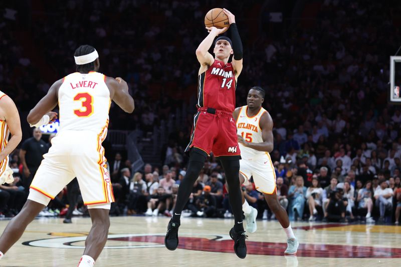 MIAMI, FLORIDA - FEBRUARY 26: Tyler Herro #14 of the Miami Heat shoots the ball against the Atlanta Hawks during the third quarter of the game at Kaseya Center on February 26, 2025 in Miami, Florida. NOTE TO USER: User expressly acknowledges and agrees that, by downloading and or using this photograph, User is consenting to the terms and conditions of the Getty Images License Agreement. (Photo by Megan Briggs/Getty Images)