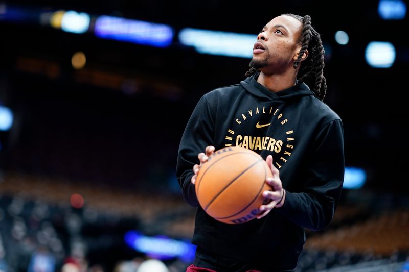 TORONTO, CANADA - FEBRUARY 12: Darius Garland #10 of the Cleveland Cavaliers warms up before the game against the Toronto Raptors on February 12, 2025 at the Scotiabank Arena in Toronto, Ontario, Canada.  NOTE TO USER: User expressly acknowledges and agrees that, by downloading and or using this Photograph, user is consenting to the terms and conditions of the Getty Images License Agreement.  Mandatory Copyright Notice: Copyright 2025 NBAE (Photo by Mark Blinch/NBAE via Getty Images)