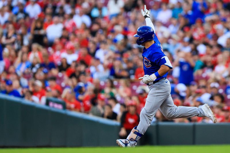 Jun 6, 2024; Cincinnati, Ohio, USA; Chicago Cubs designated hitter Seiya Suzuki (27) reacts after hitting a two-run home run in the third inning against the Cincinnati Reds at Great American Ball Park. Mandatory Credit: Katie Stratman-USA TODAY Sports