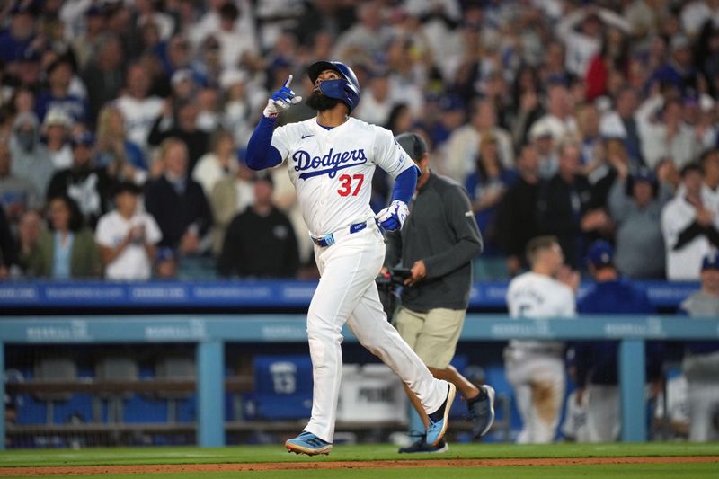 Jun 11, 2024; Los Angeles, California, USA; Los Angeles Dodgers left fielder Teoscar Hernandez (37) runs the bases after hitting a two-run home run in the sixth inning against the Texas Rangers at Dodger Stadium. Mandatory Credit: Kirby Lee-USA TODAY Sports