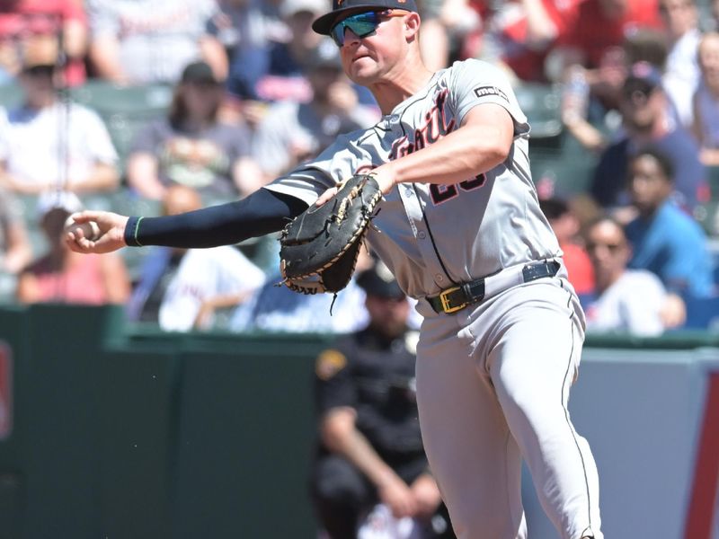 May 8, 2024; Cleveland, Ohio, USA; Detroit Tigers first baseman Spencer Torkelson (20) throws out Cleveland Guardians shortstop Brayan Rocchio (not pictured) during the second inning at Progressive Field. Mandatory Credit: Ken Blaze-USA TODAY Sports