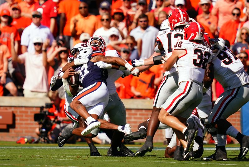 Sep 30, 2023; Auburn, Alabama, USA; Auburn Tigers running back Jarquez Hunter (27) carries the ball against the Georgia Bulldogs  during the first quarter at Jordan-Hare Stadium. Mandatory Credit: John David Mercer-USA TODAY Sports