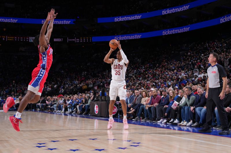 PHILADELPHIA, PA - FEBRUARY 23: Isaac Okoro #35 of the Cleveland Cavaliers shoots a three point basket against the Philadelphia 76ers on February 23, 2024 at the Wells Fargo Center in Philadelphia, Pennsylvania NOTE TO USER: User expressly acknowledges and agrees that, by downloading and/or using this Photograph, user is consenting to the terms and conditions of the Getty Images License Agreement. Mandatory Copyright Notice: Copyright 2024 NBAE (Photo by Jesse D. Garrabrant/NBAE via Getty Images)