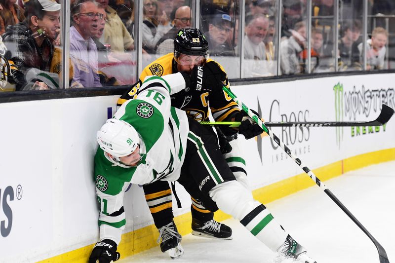 Oct 24, 2024; Boston, Massachusetts, USA; Boston Bruins left wing Brad Marchand (63) takes a glove to the face from Dallas Stars center Tyler Seguin (91) during the first period at TD Garden. Mandatory Credit: Bob DeChiara-Imagn Images