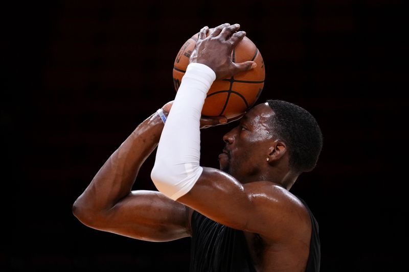 MIAMI, FLORIDA - APRIL 26: Bam Adebayo #13 of the Miami Heat warms up prior to Game Three of the Eastern Conference First Round NBA Playoffs against the Cleveland Cavaliers at Kaseya Center on April 26, 2025 in Miami, Florida. NOTE TO USER: User expressly acknowledges and agrees that, by downloading and or using this photograph, User is consenting to the terms and conditions of the Getty Images License Agreement. (Photo by Rich Storry/Getty Images)