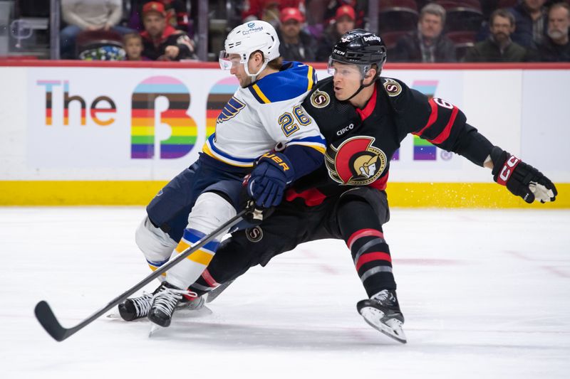 Mar 21, 2024; Ottawa, Ontario, CAN; St. Louis Blues left wing Nathan Walker (26) is taken off the puck by Ottawa Senators defenseman Jakob Chychrun (6) in the second period at the Canadian Tire Centre. Mandatory Credit: Marc DesRosiers-USA TODAY Sports