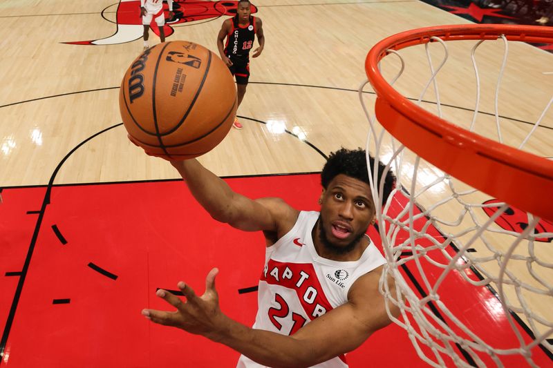 CHICAGO, ILLINOIS - JANUARY 30: Thaddeus Young #21 of the Toronto Raptors puts up a layup against the Toronto Raptors at the United Center on January 30, 2024 in Chicago, Illinois. NOTE TO USER: User expressly acknowledges and agrees that, by downloading and or using this photograph, User is consenting to the terms and conditions of the Getty Images License Agreement.  (Photo by Michael Reaves/Getty Images)