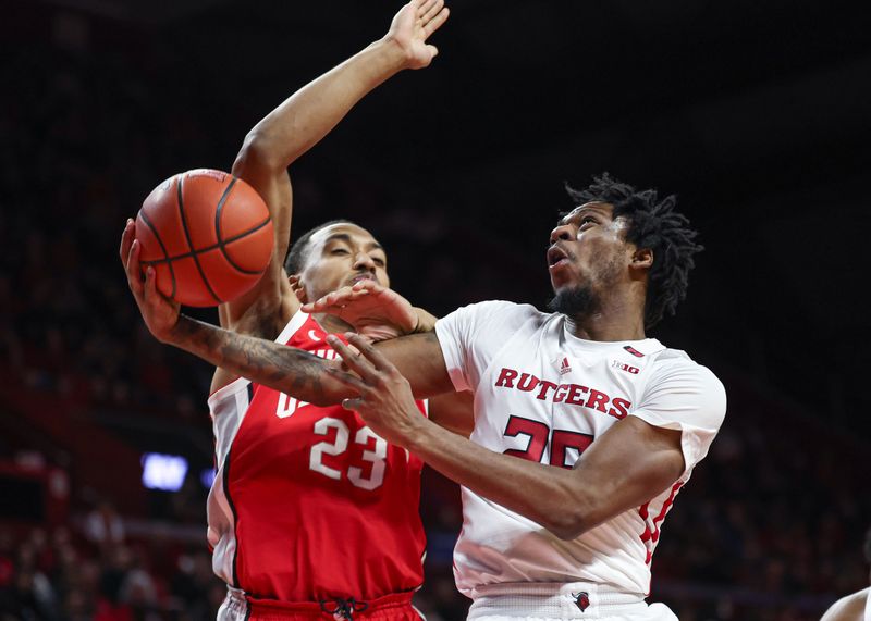 Mar 10, 2024; Piscataway, New Jersey, USA;  Rutgers Scarlet Knights guard Jeremiah Williams (25) drives for a shot against Ohio State Buckeyes forward Zed Key (23) during the second half at Jersey Mike's Arena. Mandatory Credit: Vincent Carchietta-USA TODAY Sports