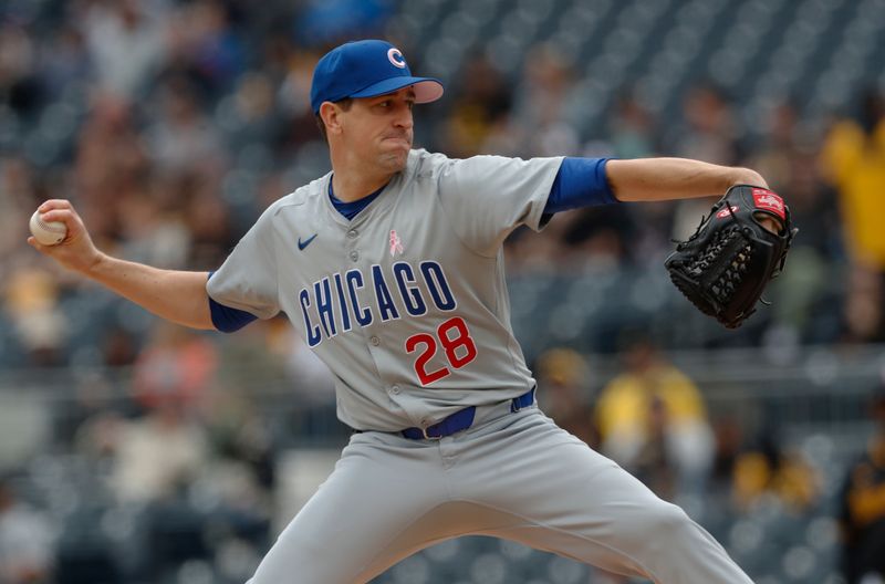 May 12, 2024; Pittsburgh, Pennsylvania, USA;  Chicago Cubs starting pitcher Kyle Hendricks (28) delivers a pitch against the Pittsburgh Pirates during the first inning at PNC Park. Mandatory Credit: Charles LeClaire-USA TODAY Sports